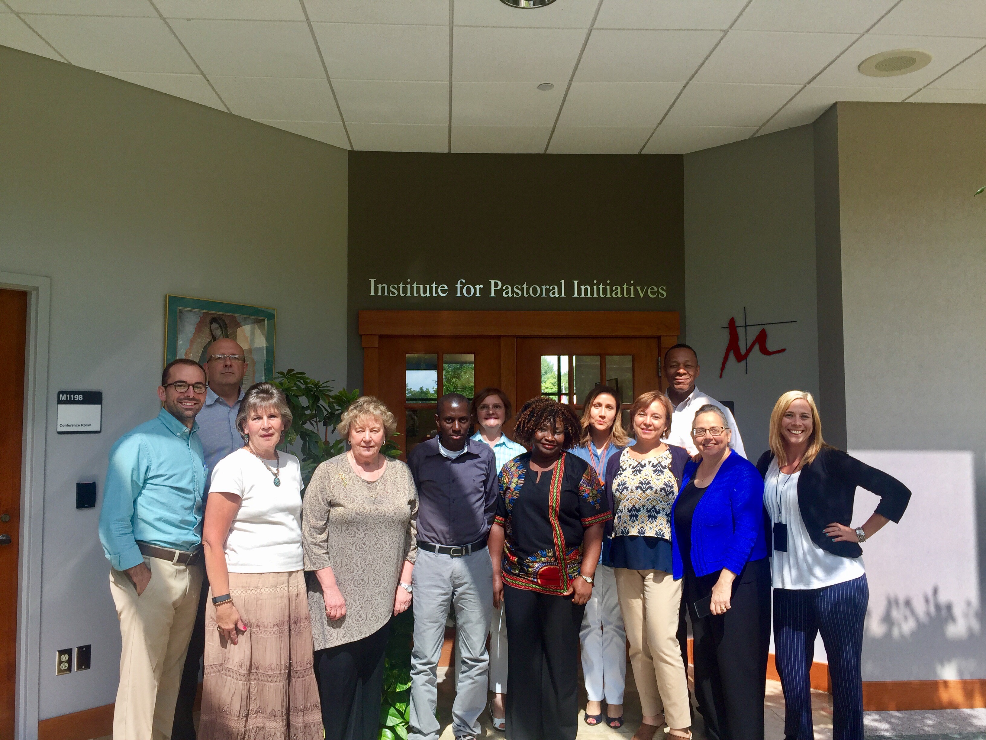 Ignatius Mvula with the IPI staff during his visit to Dayton in 2017.