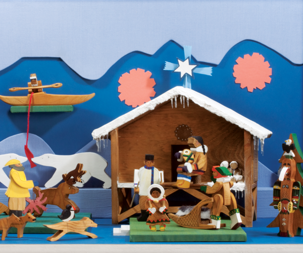 Hand-carved and hand-painted wood Nativity set featuring animals such as arctic foxes, wolves, polar bears, a penguin, a moose and a seal. Other items in the set include a kayak, a totem pole and a snow covered stable with the Holy Family inside.   