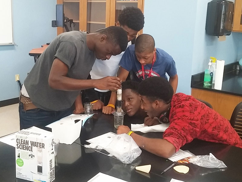 Group of students working on a science experiment