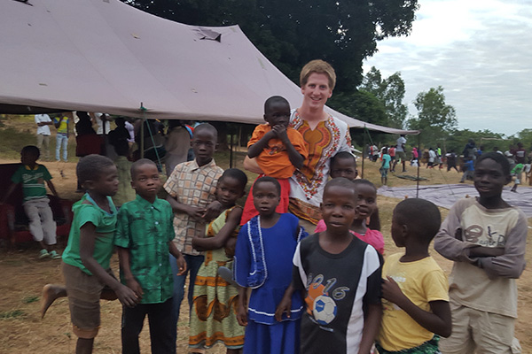 Reed Kaiser with friends in Malawi.