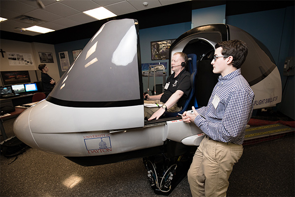 Andrew Killian, University of Dayton team, at flight design test in Flight Simulator lab in Kettering Labs