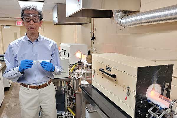 Researcher Tak Yamada in lab